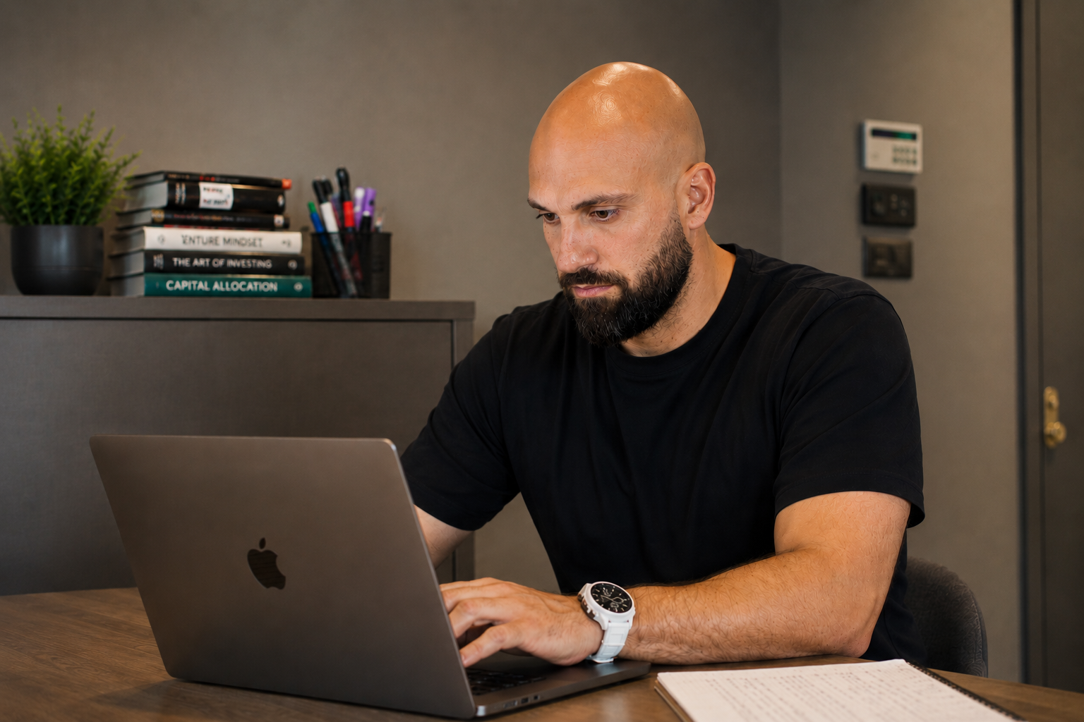 Tunc Tatlici working at his desk
